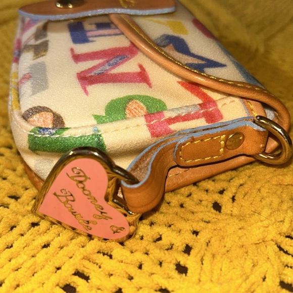 Vintage Dooney & Bourke Coated Canvas Pouch - Picture 15 of 16